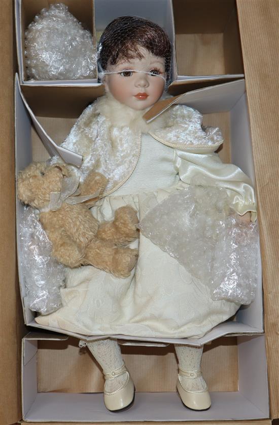 Three modern boxed dolls